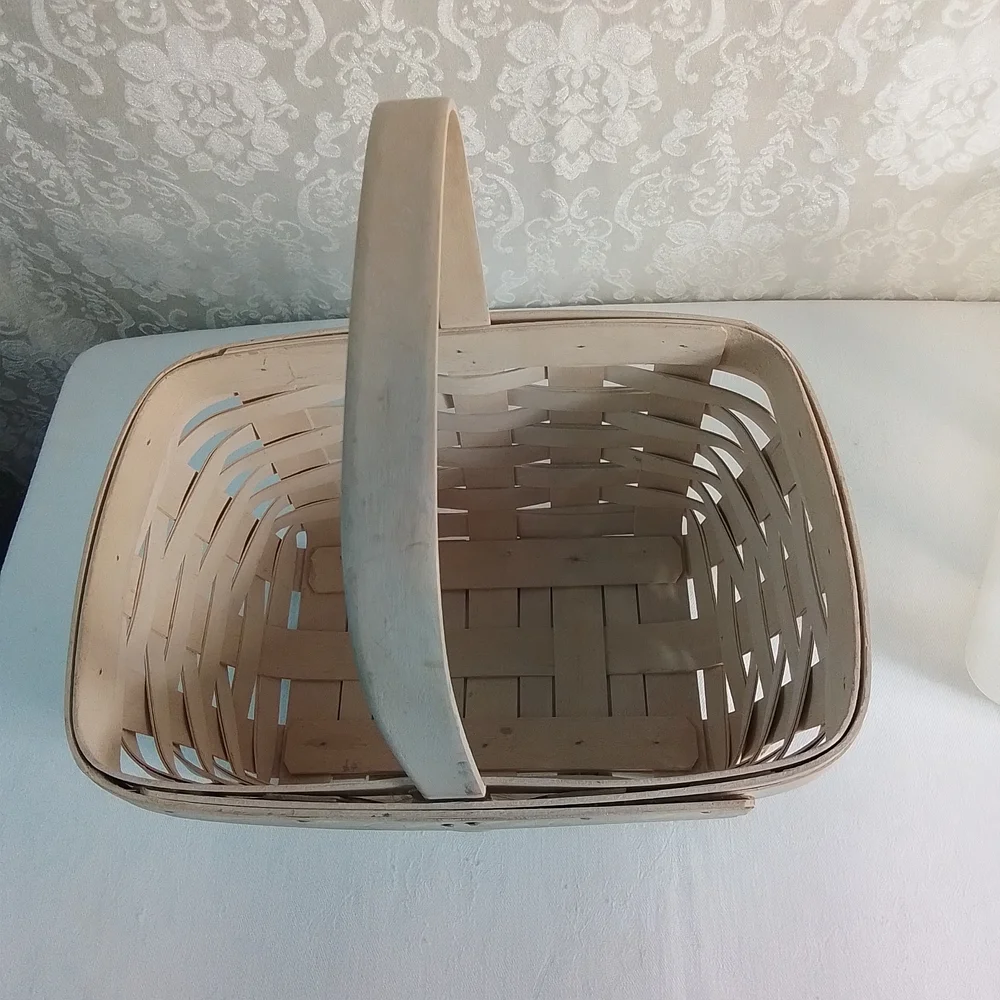 Longaberger light tan woven basket with handle and plastic insert